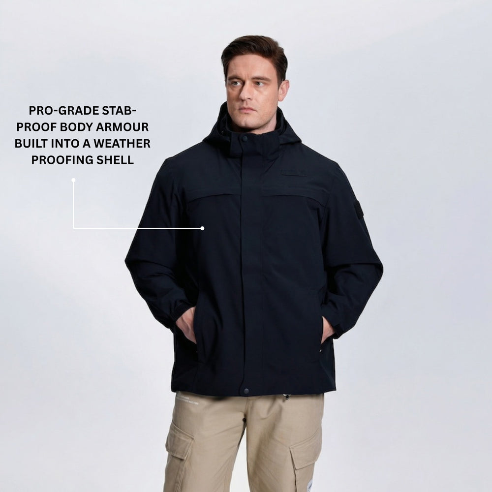 Man wearing a black stab-proof jacket on a light gray well-lit studio background