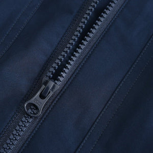 Full outfit view of stab-proof Harrington jacket worn by model