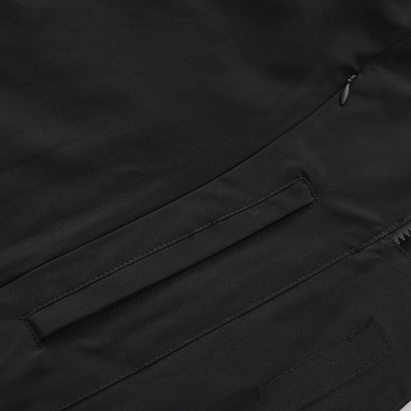 Jacket collar and closure detail with protective layering visible
